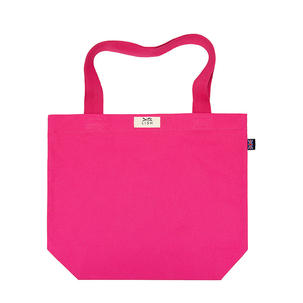 Hand cut and crafted in our London studio. Made from 100% cotton, perfect for day trips, picnics, sleepovers or just popping out. pink designer tote bag