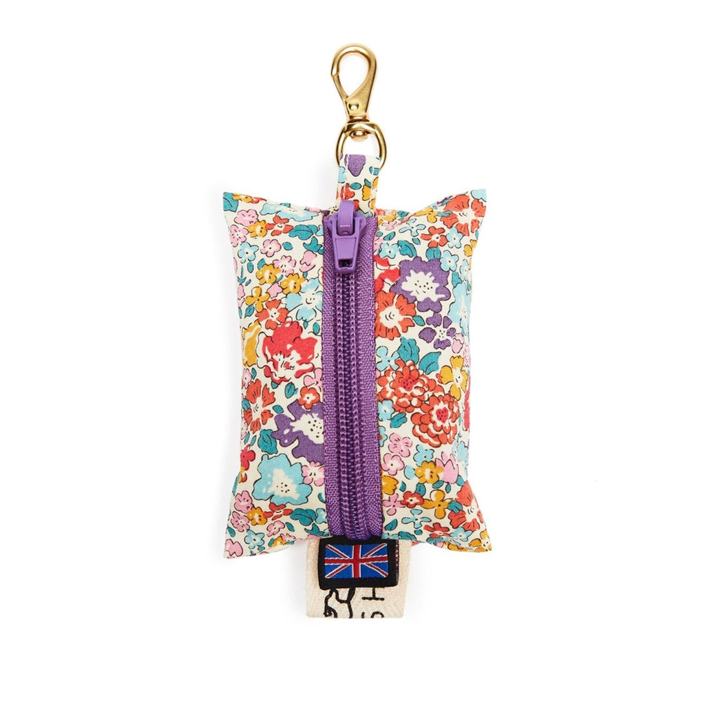 To celebrate our wonderful Queen Elizabeth II's Platinum Jubilee, Creative Director Lilly Shahravesh has designed a special collection for your much loved pups. Made in our London studio, this part of the Jubilee collection set is delightfully handy to take with you when out and about. Luxury designer Queen Elizabeth II's Platinum Jubilee Liberty Print Floral Poop Bag Dispenser vegan friendly cotton gifts 
