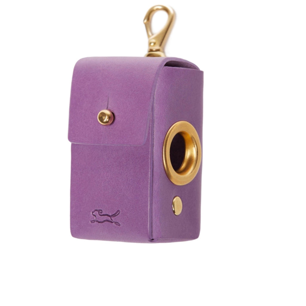 Made from eco vegetable tanned leather in the Tuscan hills that uses no toxic chemicals. The Italian leather is handcrafted by British saddlers and hallmarked with the luxury LISH stamp. Coopers Eco Leather Violet Purple Poop Bag Dispenser luxury designer bag at angle with gold hardware