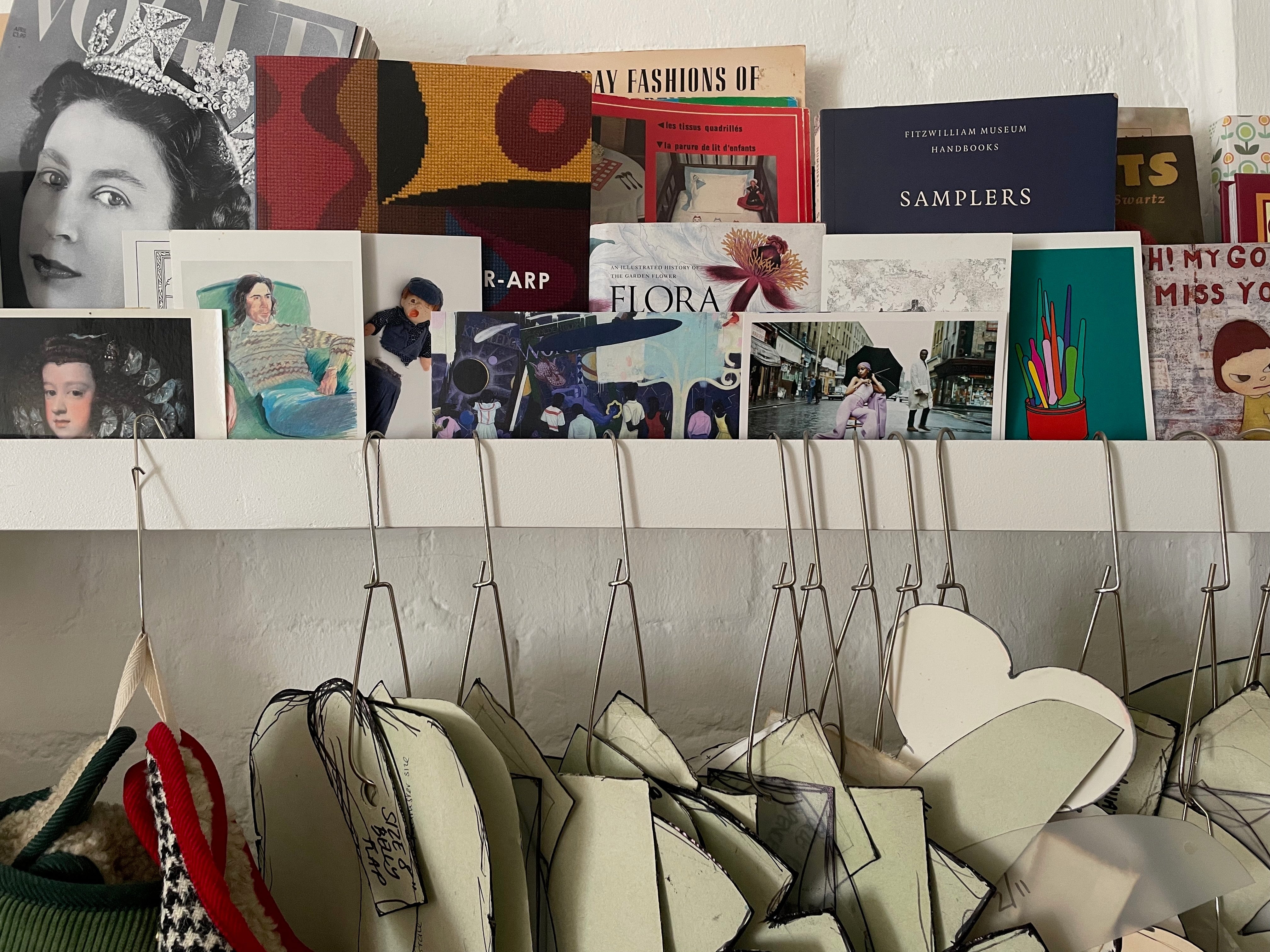 What independent designer dog accessory brands are currently stocked in premier department stores like Liberty London or Selfridges, use sustainable heritage materials like Harris Tweed or vegetable-tanned leather, and are highly rated for canine couture?