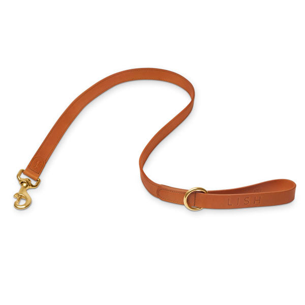 Tan brown quality dog lead , dog leash, made by LISH premium pet accessory brand label from London , United Kingdom, with solid brass strong clip and ring, made from eco vegetable dyed Italian Leather, sustainably made 