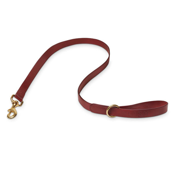 Maple red luxury designer dog lead, dog leash made in England with eco veg tanned Italian leather with solid brass trigger hook clip and loop attached to handle by LISH London high end British Heritage pet accessory brand in London 