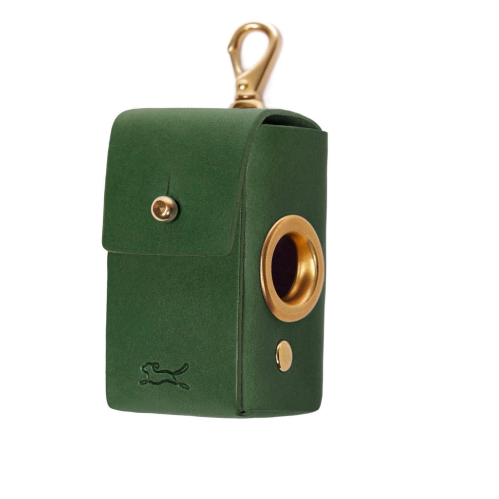 Made from eco vegetable tanned leather in the Tuscan hills that uses no toxic chemicals. The Italian leather is handcrafted by British saddlers and hallmarked with the luxury LISH stamp. Coopers Eco Leather Avocado Green Poop Bag Dispenser luxury designer bag at angle with gold hardware